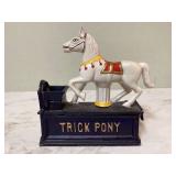 Vintage toy bank horse kicks coin into slot