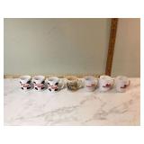 6 vintage Boomtown Casino mugs and 1 Wyoming mug