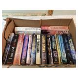 Various paperback books