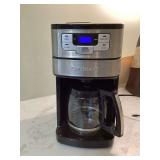 Coffee maker with grinder