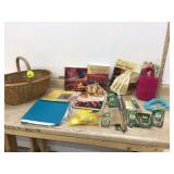 Basket with various knitting needles and books