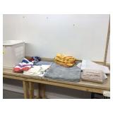 Assorted floor mats in basket