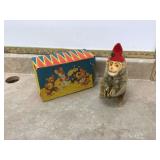 Vintage wind-up toy with box featuring Jolly Chimp