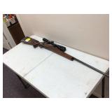 Antique Swedish bolt action rifle with scope