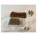 Box of 35 Winchester 38 Special with leather holder Box of 35 Winchester 38 Special with leather holder