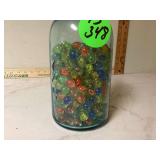 Vintage marbles in large jar Vintage marbles in large jar