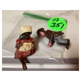 Antique cast iron coachmen and resin little girl figurines Antique cast iron coachmen and resin little girl figurines