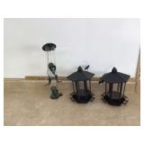 Three plastic bird feeders