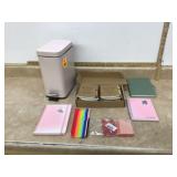 Pink waste basket with journals