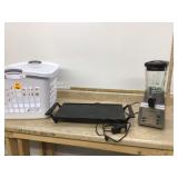 Appliances in laundry basket