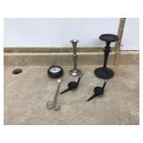 Various candle holders and clock items