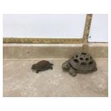 Decorative turtle-themed candleholder and cast iron turtle figurine