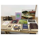 Books displayed between iron bookends