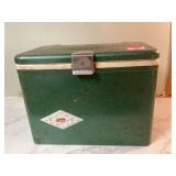 Old green metal Coleman cooler