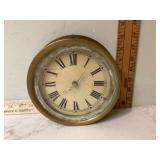 Old brass nautical clock
