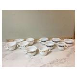 Collectible retro Pyrex coffee cups and cream pitchers various designs