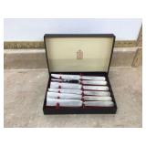 Antique knife set with mother of pearl handles