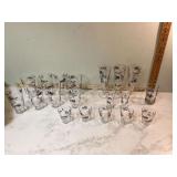 Set of 18 horse carriage glasses and 1 train engine glass by Lib