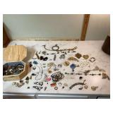 Box with old jewelry and random items