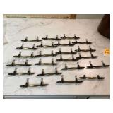 22 identical drawer pulls for matching cabinets