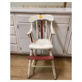Wooden highchair worn