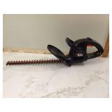 Electric hedge trimmer by Black & Decker