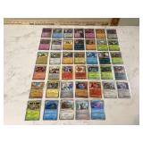 Forty holographic Pokemon trading cards