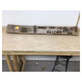 Antique locks displayed on rustic barn wood