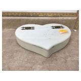 Small heart-shaped storage container