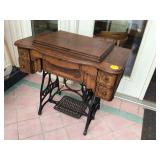 Antique sewing machine table
