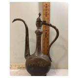 Vintage hammered metal pitcher