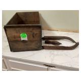 Vintage crate with old ice skates (straps missing)
