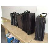 4 ROLLING SUITCASES