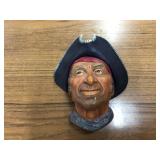 Vintage English chalkware wall plaque of Captain Kid
