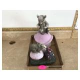 Purple mushroom and mice yard ornaments