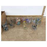 Disney-themed collectible glasses and merchandise