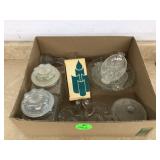 Assorted glassware for candles or serving