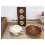 Gold-trimmed wooden bowl with lid from Minising with a barometer