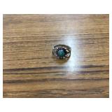Silver ring with single garnet gem weighing 27 grams