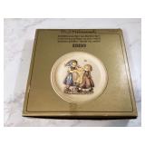 Decorative collectible plate featuring a spring dance theme
