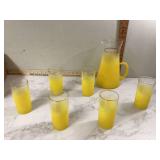 Yellow frosted glass pitcher and matching glasses