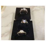 Two opal silver rings one cubic zirconia