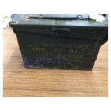 Small ammo box with empty brass