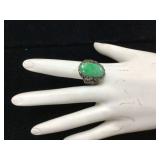 Silver ring with faded green stone 42g