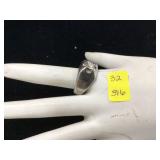 Silver ring with clear stone marked 925 78 grams