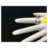 Silver ring with heart-shaped clear stone 49 grams