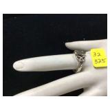 Silver ring with purple stone marked 925 32g