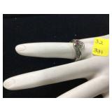 Silver ring with purple and clear stones marked 925 weighs 4