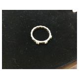 A 925 silver ring with clear stones weighing 23 grams