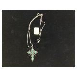 Sterling silver necklace with green stone cross pendant